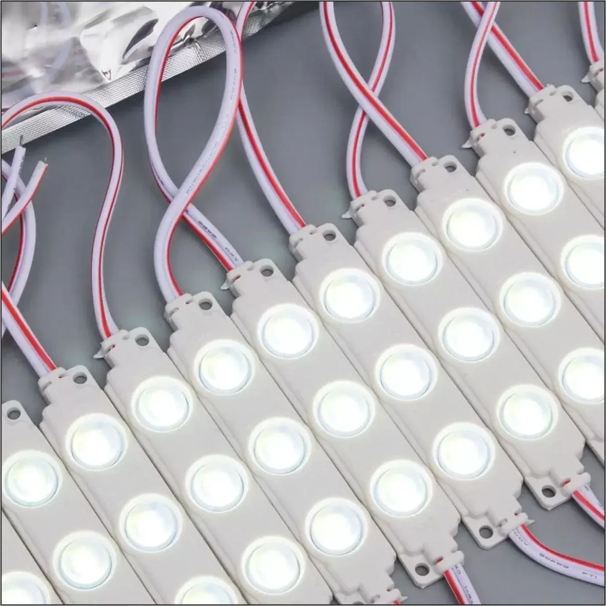 Strings of white lens LED modules